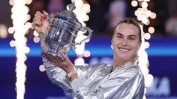 Aryna Sabalenka poses with the US Open trophy.