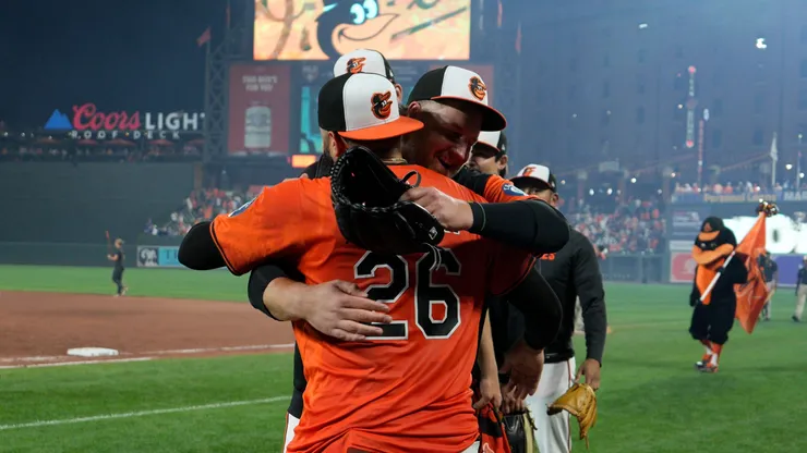 Emmanuel Rivera #26 of the Baltimore Orioles celebrates with teammates.