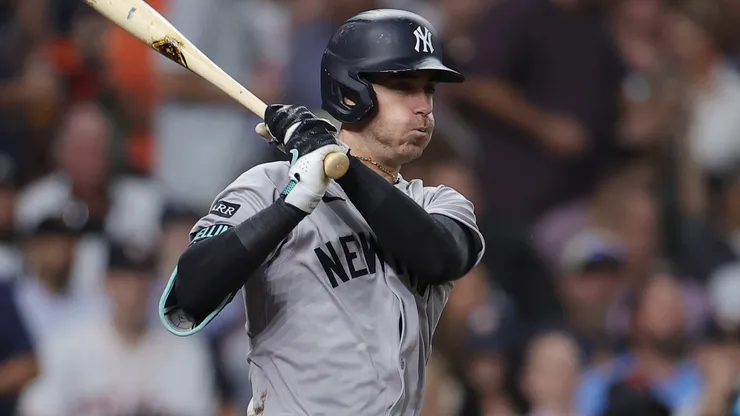 Cody Bellinger #35 of the New York Yankees hits an RBI single.