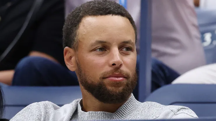 NBA player Steph Curry attend the Men's Singles Final match.