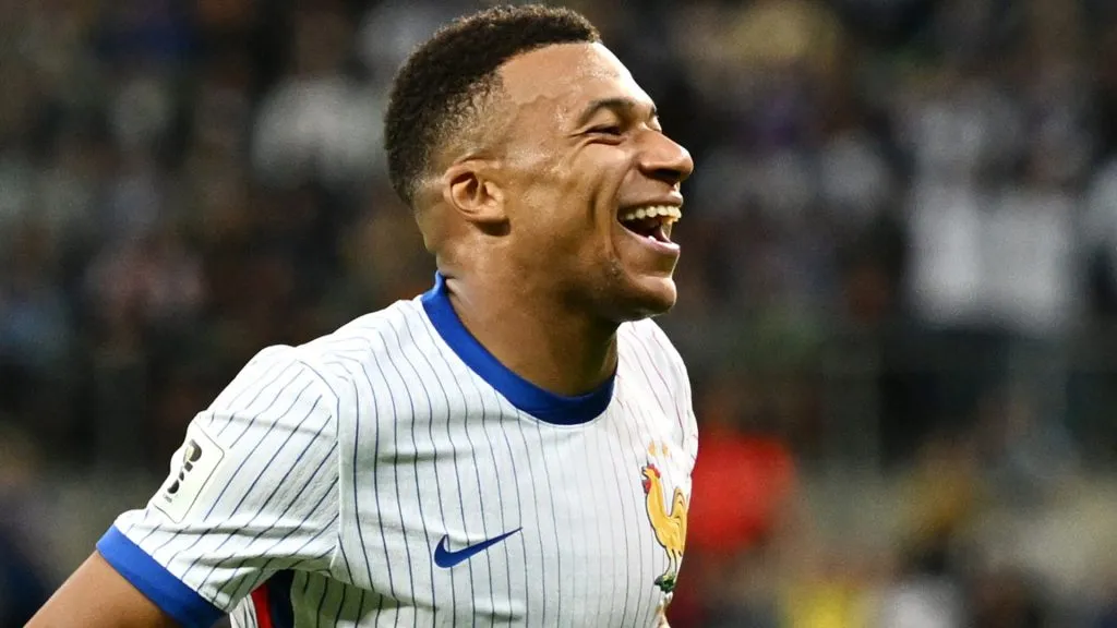 Kylian Mbappe smiling
