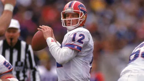 Quarterback Jim Kelly #12 of the Buffalo Bills looks to pass during a game against the Los Angeles Raiders in 1991.