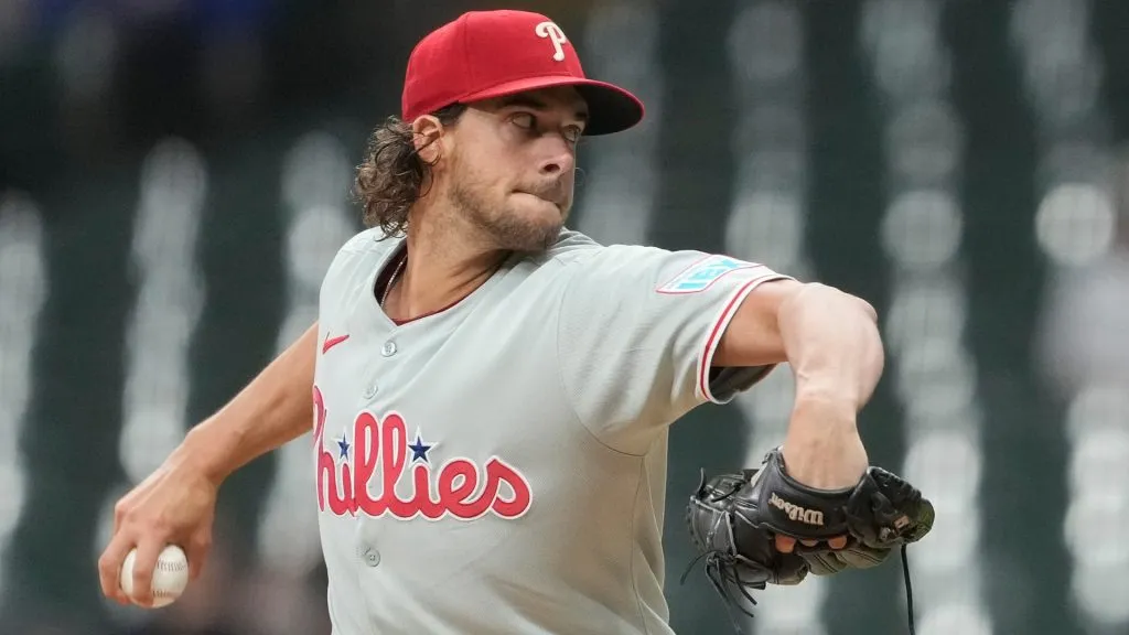 Aaron Nola delivers a rare cutter to strike out Juan Soto during a key sixth-inning showdown. (Photo by Patrick McDermott/Getty Images)