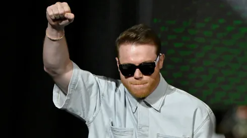 Canelo Alvarez speaks onstage during the press conference.