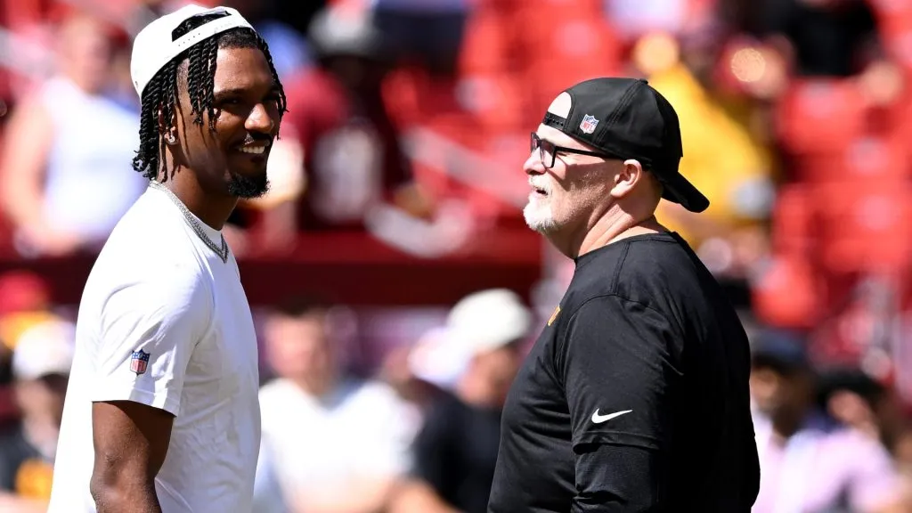 Dan Quinn with Jayden Daniels