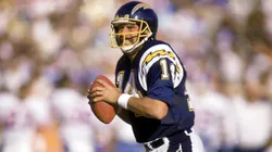 Dan Fouts #14 of the San Diego Chargers looks to pass during a 1987 NFL game.