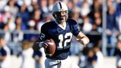 Kerry Collins rolls out of the pocket while looking for an open receiver in 1994.