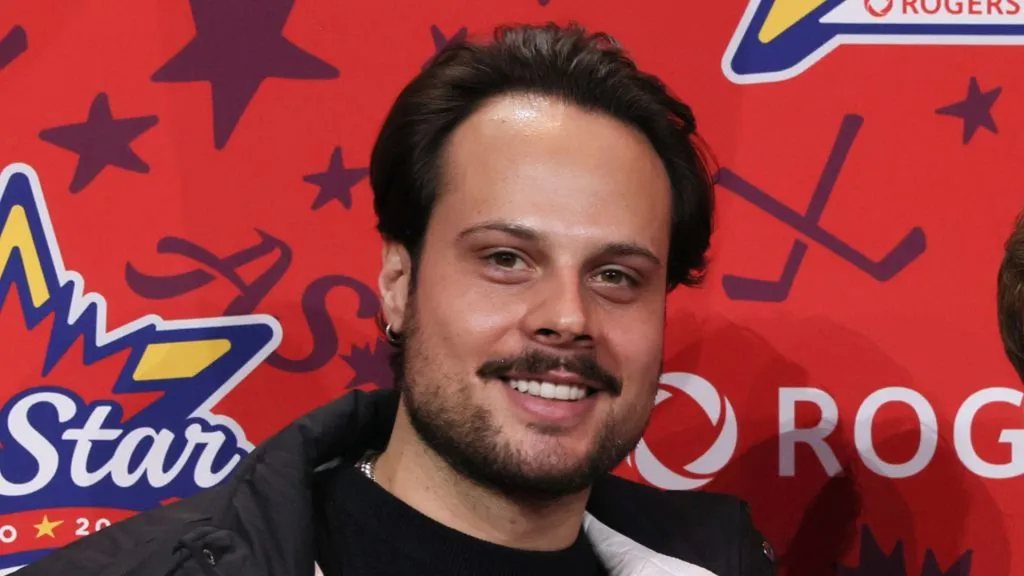 Auston Matthews smiling for a picture