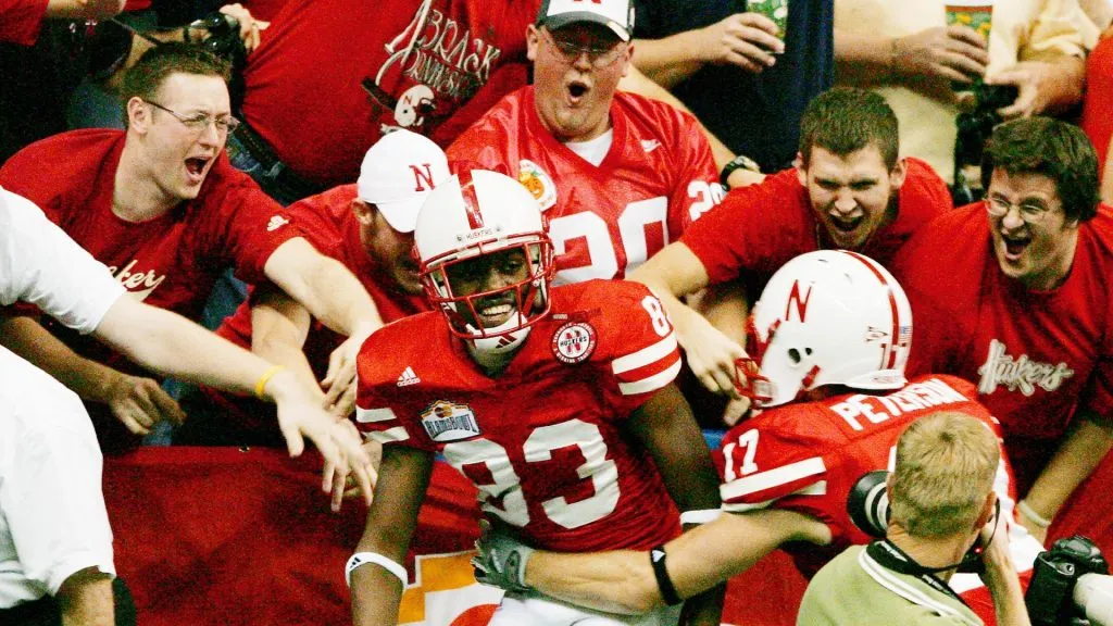 Fans celebrate with Nebraska’s Terrence Nunn and Todd Peterson in 2005. (Source: Darren Abate/Getty Images)