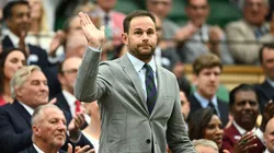 Former tennis player, Andy Roddick waves from the Royal Box.