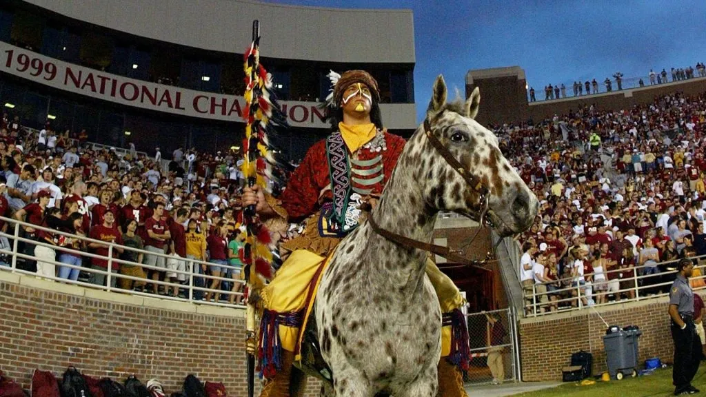 Chief Osceola and his horse Renagade wait on the field in 2005. (Source: Doug Benc/Getty Images)
