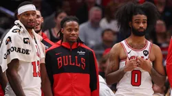 Torrey Craig #13, DJ Steward #00, Coby White #0 of the Chicago Bulls look on.