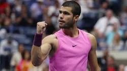 Carlos Alcaraz celebrates a point against Jannik Sinner.