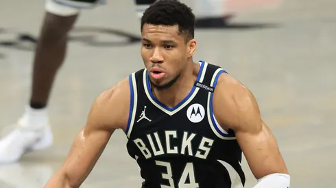 Giannis Antetokounmpo #34 of the Milwaukee Bucks brings the ball up the court.