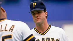 Andy Van Slyke #18 of the Pittsburgh Pirates talks during a 1990 MLB season game.