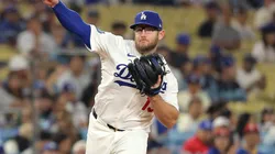 Max Muncy #13 of the Los Angeles Dodgers throws to first base.