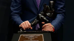 Joe Burrow of the LSU Tigers winner of the 85th annual Heisman Memorial Trophy poses for photos on December 14, 2019.