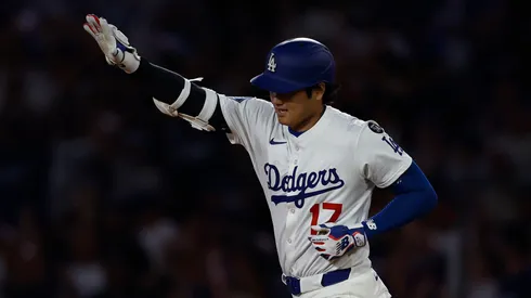 Shohei Ohtani #17 of the Los Angeles Dodgers celebrates his 50th home run.