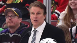 HC Jim Hiller of the Los Angeles Kings looks on during an NHL game.