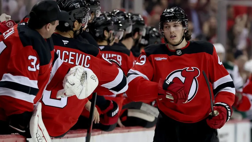 Luke Hughes #43 of the New Jersey Devils celebrates his goal with teammates. (Photo by Elsa/Getty Images)