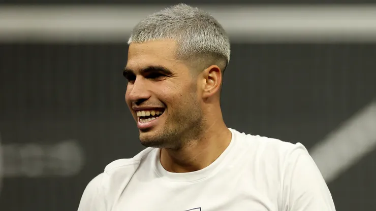 Carlos Alcaraz reacts during a practice session.