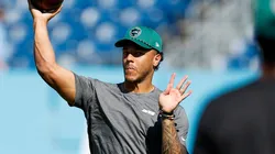 Quarterback Adrian Martinez warms up prior to a game.