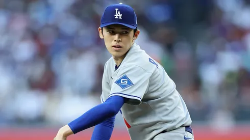 Roki Sasaki #11 of the Los Angeles Dodgers pitches.