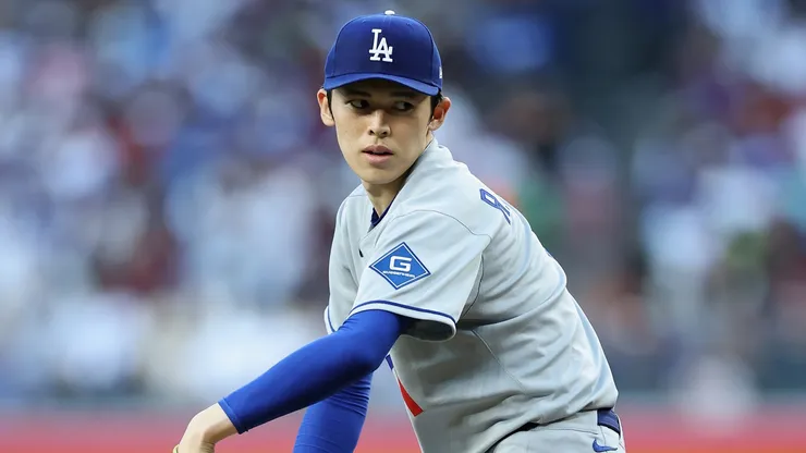 Roki Sasaki #11 of the Los Angeles Dodgers pitches.
