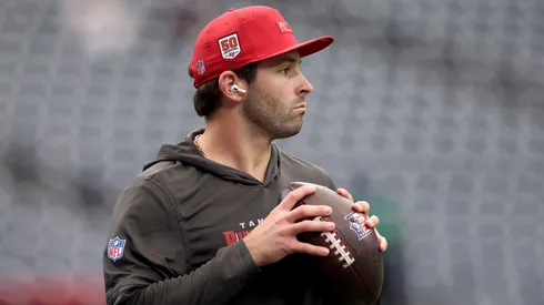 Baker Mayfield warms up prior to the game against the Texans on September 15, 2025 in Houston.