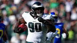 Jordan Davis #90 of the Philadelphia Eagles returns a blocked field goal for a touchdown.