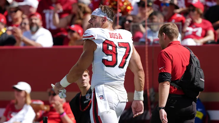 Nick Bosa #97 of the San Francisco 49ers walks to the locker room.