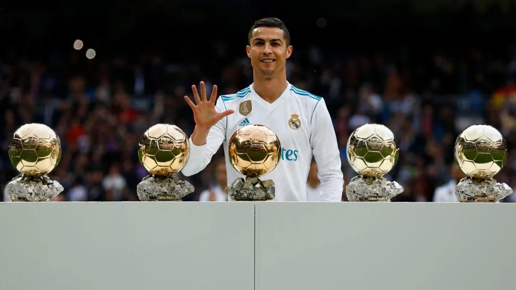 Cristiano Ronaldo of Real Madrid CF poses with his five Ballon d’Or trophies in 2017. (Source: Gonzalo Arroyo Moreno/Getty Images)