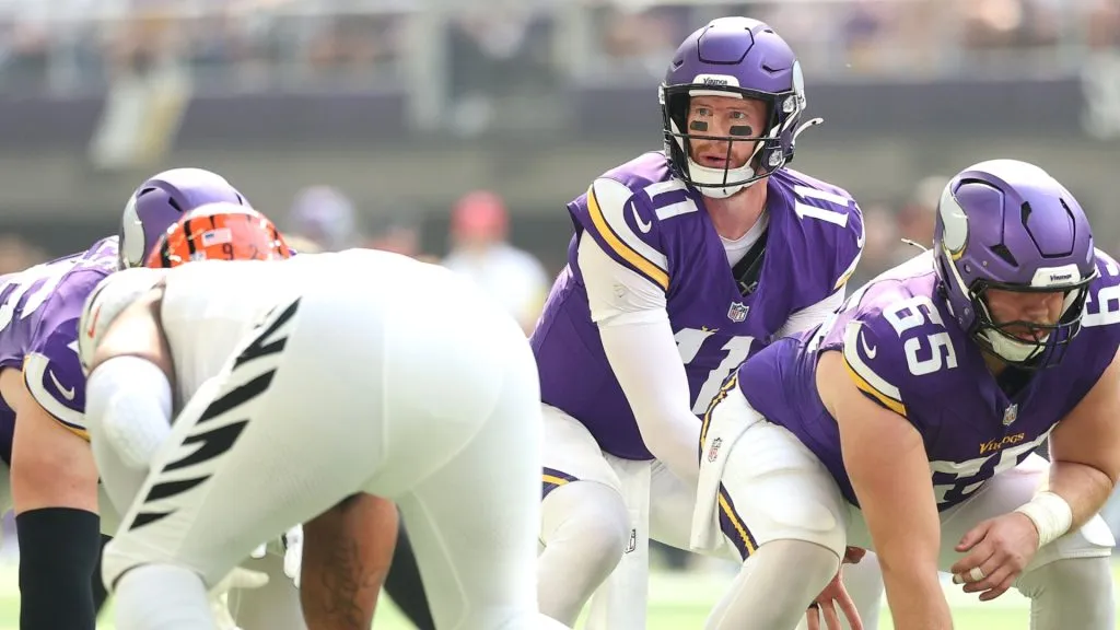 Carson Wentz at the line of scrimmage during the first quarter in 2025. (Source: David Berding/Getty Images)