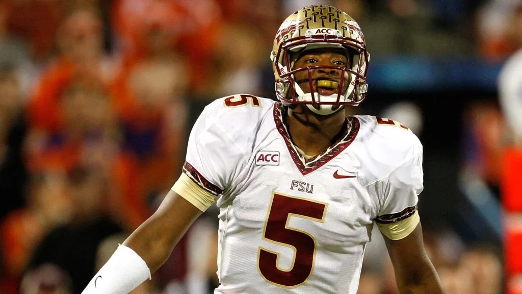 Jameis Winston #5 of the Florida State Seminoles calls a play in 2013. (Source: Tyler Smith/Getty Images)