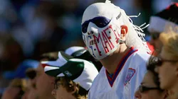 Fans that are members of the Bills Mafia look at the scoreboard in the fourth quarter in 2011.