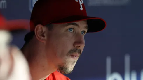 Walker Buehler #31 of the Philadelphia Phillies watches a video.