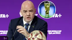 FIFA President Gianni Infantino and A detailed view of the FIFA World Cup Trophy.