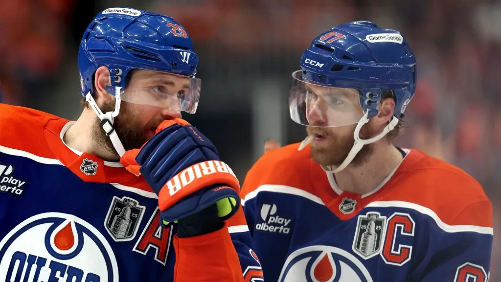Leon Draisaitl and Connor McDavid of the Oilers look on during the 2025 Stanley Cup Final. (Photo by Steph Chambers/Getty Images)