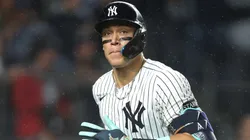 Aaron Judge #99 of the New York Yankees reacts to hitting a solo home run.