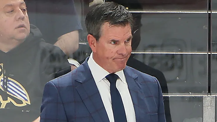 Mike Sullivan of the New York Rangers handles bench duties during the game.