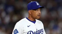 Dave Roberts #30 of the Los Angeles Dodgers looks on.