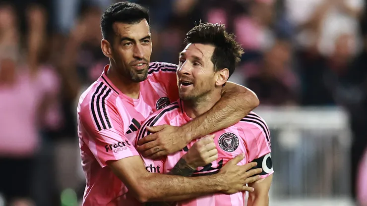 Lionel Messi #10 of Inter Miami CF celebrates with teammate Sergio Busquets #5.