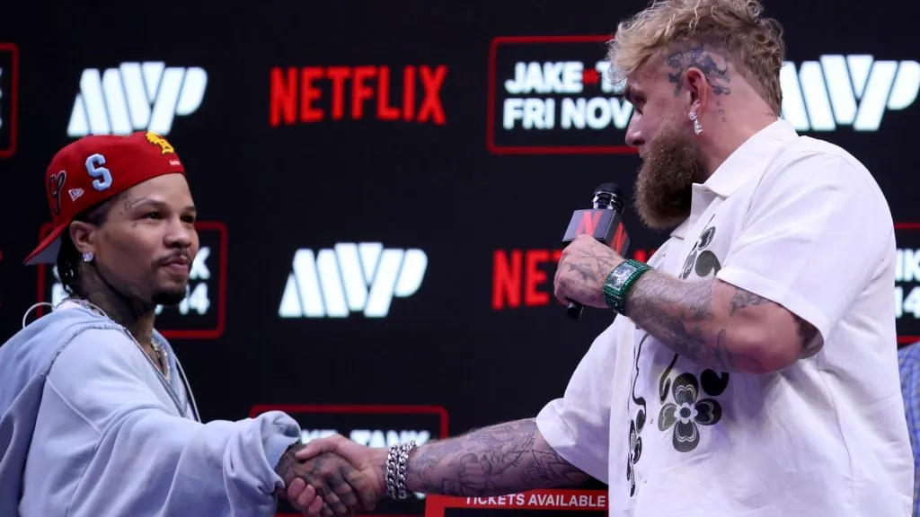 Gervonta Davis and Jake Paul shake hands at news conference for their exhibition match. (Photo by Leonardo Fernandez/Getty Images)