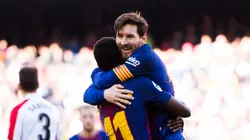Lionel Messi of FC Barcelona celebrates with his teammate Ousmane Dembele