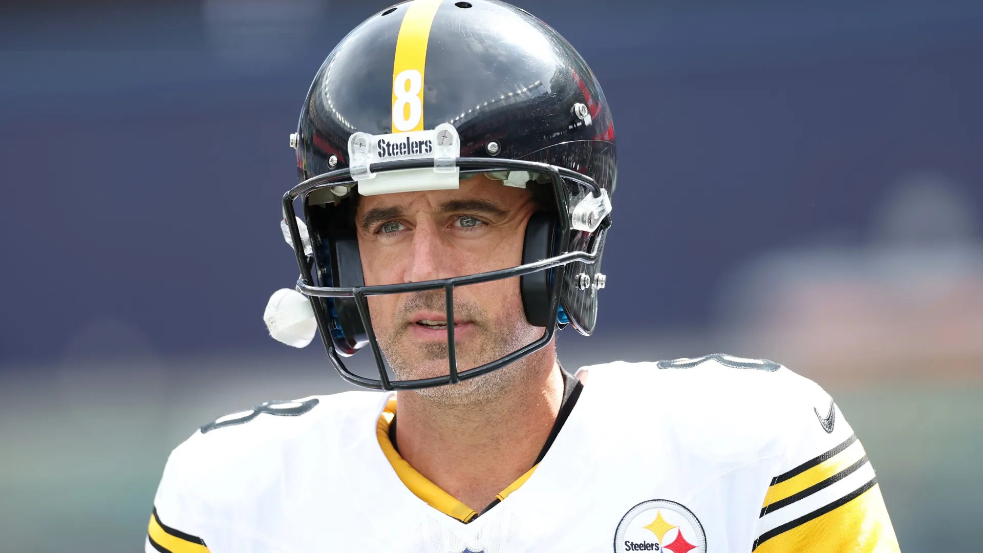 Aaron Rodgers looks on during a Steelers game