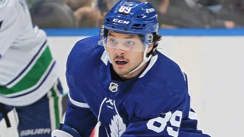 Nick Robertson #89 of the Toronto Maple Leafs skates with the puck.