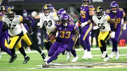 Dalvin Cook of the Vikings carries the ball in the second quarter of the game against the Steelers in 2021.