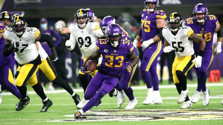 Dalvin Cook of the Vikings carries the ball in the second quarter of the game against the Steelers in 2021.