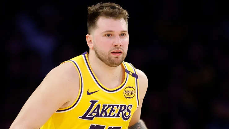 Luka Doncic #77 of the Los Angeles Lakers dribbles during an NBA game.