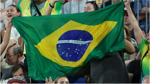 Fans wave a flag for Team Brazil